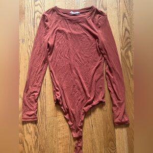Long sleeve ribbed rusty orange bodysuit